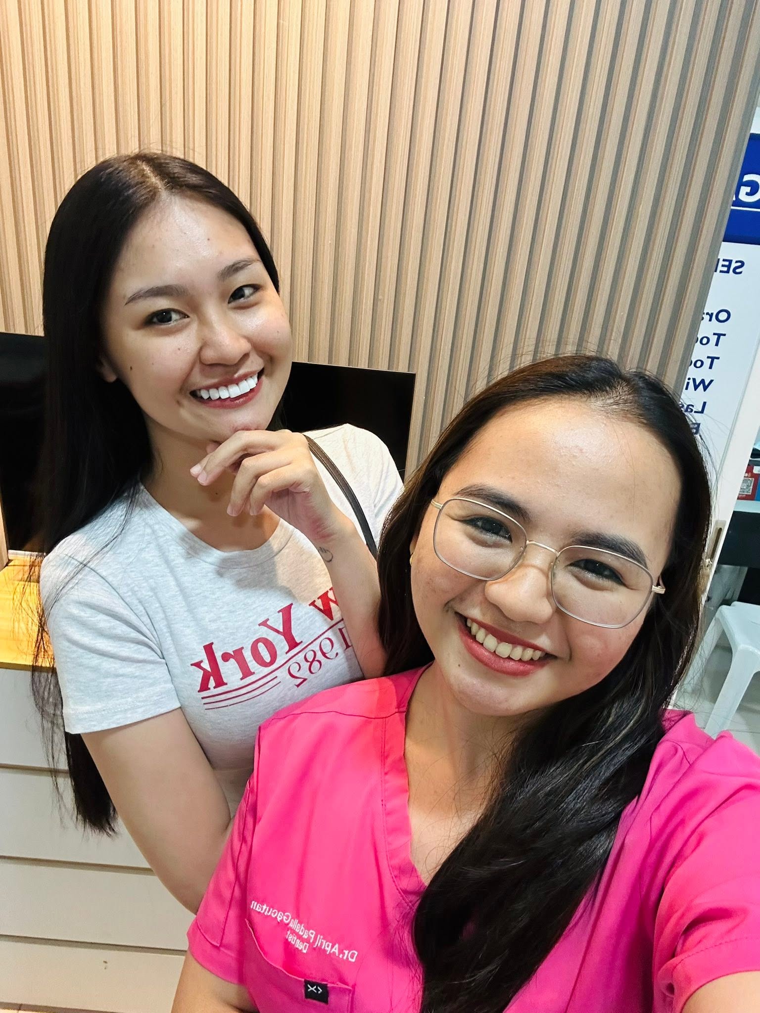 Dr. Gacutan with a happy patient after her appointment